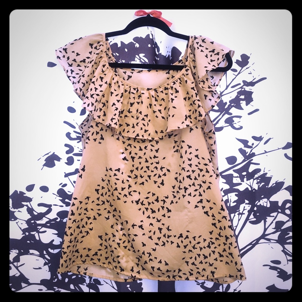 Bird print blouse with ruffled neckline